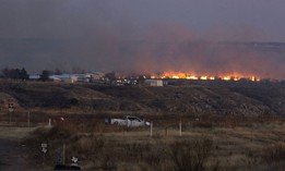 Firefighters battle flames from the Smokehouse Creek fire on March 3, 2024, near Sanford, Texas.
