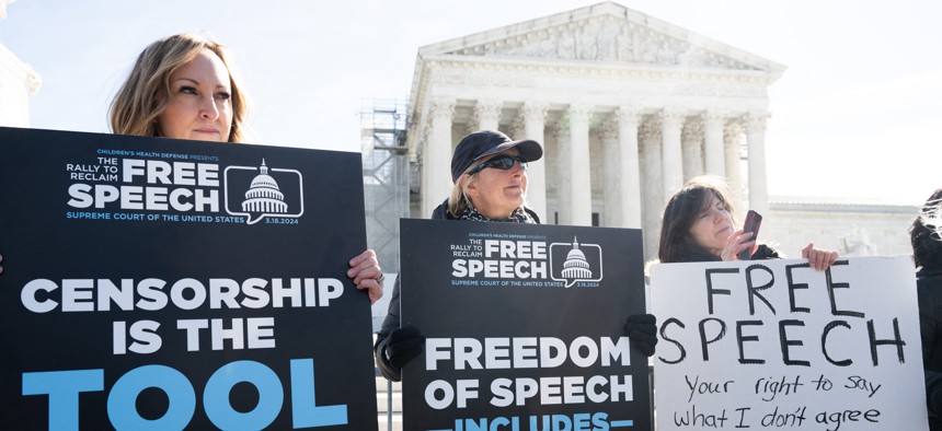 Conservative demonstrators who allege that the government pressured or colluded with social media platforms to censor right-leaning content under the guise of fighting misinformation protest outside the US Supreme Court in Washington, DC, March 18, 2024, as the Court hears oral arguments in the case of Murthy v. Missouri.