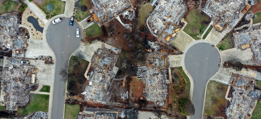 Aerial view of homes destroyed by the 2018 Camp Fire in Paradise, Calif. The fire, which killed 85 people, was blamed on inadequate equipment inspection and maintenance by PG&E, one of the state’s largest utilities.