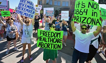 Pro-abortion rights demonstrators rally in Scottsdale, Arizona on April 15, 2024, after the state's top court in Arizona ruled a 160-year-old near total ban on abortion is enforceable.
