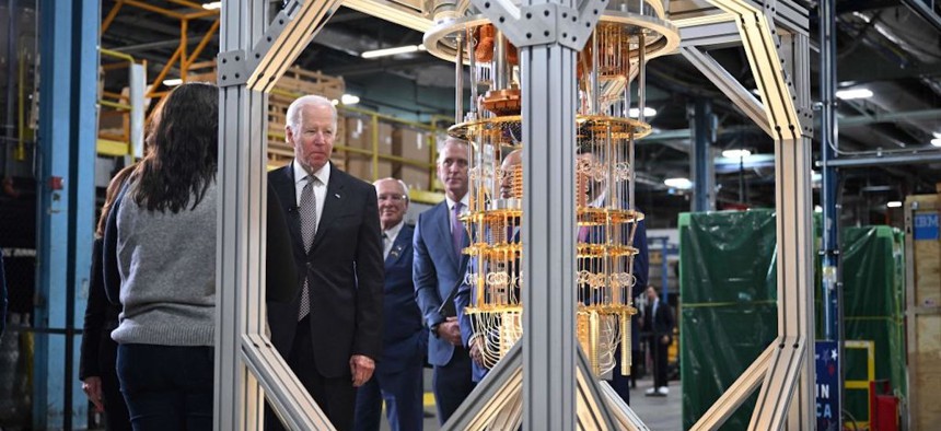 President Joe Biden looks at a quantum computer as he tours the IBM facility in Poughkeepsie, New York, on October 6, 2022. 