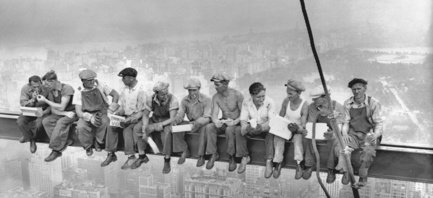 This iconic photo, titled Lunch Atop a Skyscraper, depicts 11 men eating lunch while sitting on a steel beam 850 feet above the ground on the sixty-ninth floor of the near-completed RCA Building (now known as 30 Rockefeller Plaza) at Rockefeller Center in Manhattan, New York City, on September 20, 1932.