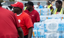 The Salvation Army of Jackson and Walmart distribute bottled water at a Walmart location on August 31, 2022 in Jackson, Mississippi. Jackson was experiencing a third day without reliable water service after river flooding caused the main treatment facility to fail. 