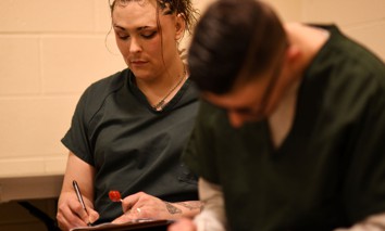  Inmates are discussing self-sabotage with Anastasia Romero from Denver Health's jail-to-community program at Van Cise-Simonet Detention Center in Denver, Colorado on Aug. 3, 2023.