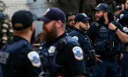 Law Enforcement stand along H Street after clearing out a Pro-Palestinian encampment at George Washington University's University Yard on May 8, 2024 in Washington, D.C. 