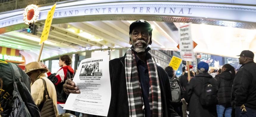 Union activists and workers' rights groups protest, to demand sick pay and union rights for rail workers, at Grand Central Terminal in New York, United States on December 7, 2022.