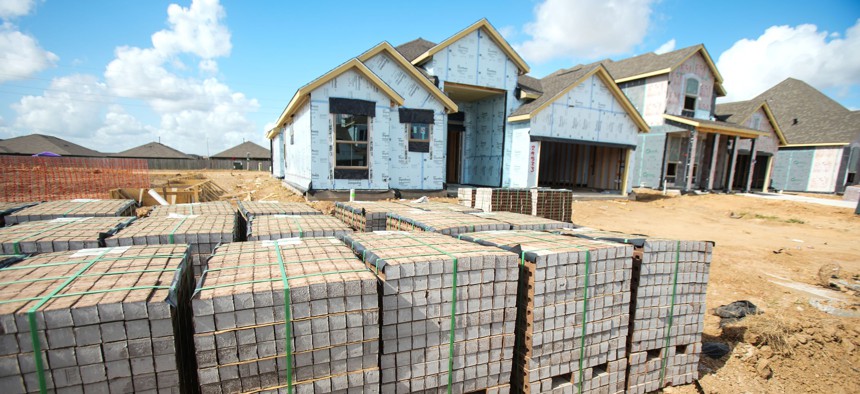 Work continues on new home being built Wednesday, June 22, 2022 in Katy, Texas.