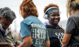 Danielle Stephen, 20, participates in a Christian service May 8 in Houston's Montrose neighborhood. Stephen, who was kicked off campus and into the streets as a high school student, attended the outdoor service to support people struggling with homelessness. 