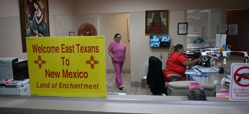 A sign welcoming patients from East Texas is displayed in the waiting area of the Women's Reproductive Clinic, which provides legal medication abortion services, in Santa Teresa, New Mexico, on June 15, 2022. 