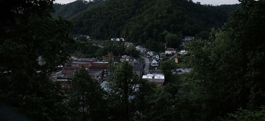 Downtown Welch sits under the mountains in rural West Virginia on May 19, 2017, in Welch, West Virginia. 