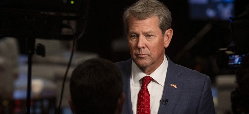 Georgia Gov. Brian Kemp blames the Biden administration for the state's poor Medicaid expansion program enrollment.