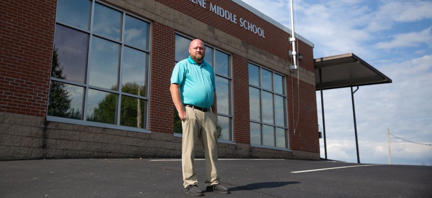 Josh Arrowood, who teaches sixth grade world history at South Greene Middle School in Greeneville, Tenn., is open to carrying his .22 caliber handgun during class. A new state law that passed last spring would let him carry under certain conditions.