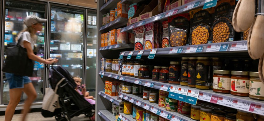 People shop at a grocery store on Aug. 14, 2024, in New York City. 