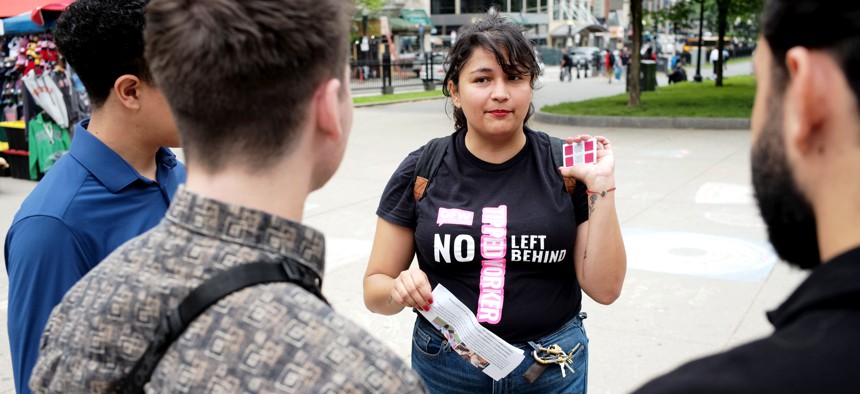 Estefania Galvis of One Fair Wage, the organization backing a November referendum in Massachusetts that would gradually increase the wage of tipped employees, distributed literature in Boston on May 23, 2024. 