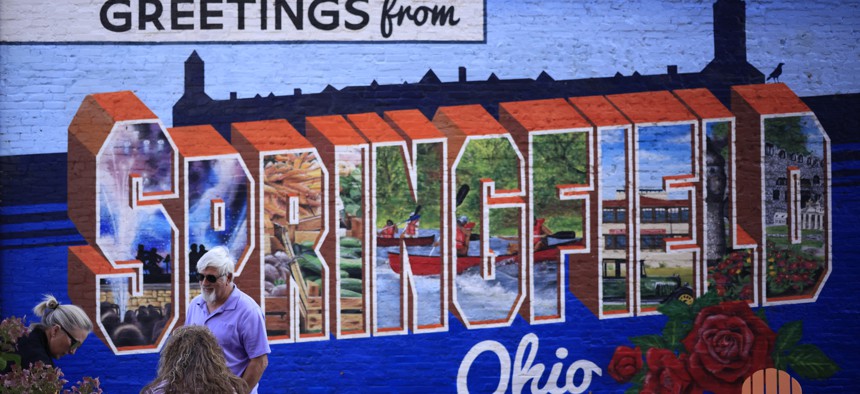 A mural is displayed in an alley downtown in Springfield, Ohio, home to a large Haitian community that was thrust into the national spotlight after former President Donald Trump claimed they were eating residents' cats and dogs.