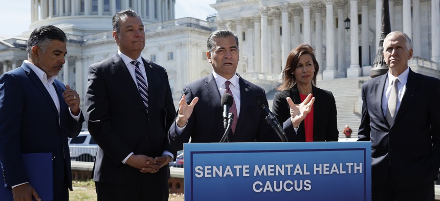 In March 2024, FCC Chairwoman Jessica Rosenworcel (second from right) joined U.S. Health and Human Services Secretary Xavier Becerra (center) and fellow congressmen to advocate for georouting for 988 hotline calls.