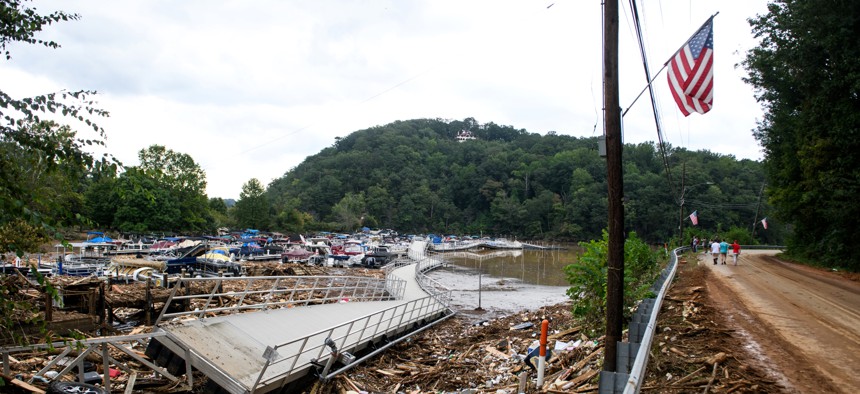 The Rocky Broad River flows into Lake Lure and overflows the town with debris from Chimney Rock, N.C., after heavy rains from Hurricane Helene on September 28, 2024.