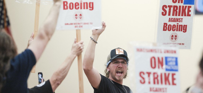 Union members react as it is announced back in September that the union has rejected a proposed Boeing contract and will go on strike.