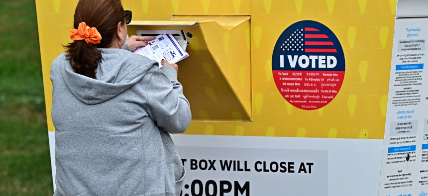 People drop off their ballots at the Los Angeles County Registrar on Oct. 28, 2024, in Norwalk, Calif.