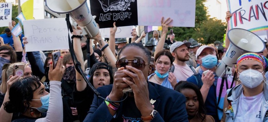 Democratic candidate for congress Odessa Kelly speaks on the sidelines of a rally against gender-affirming care in Nashville at the War Memorial Plaza on Oct. 21,2022.