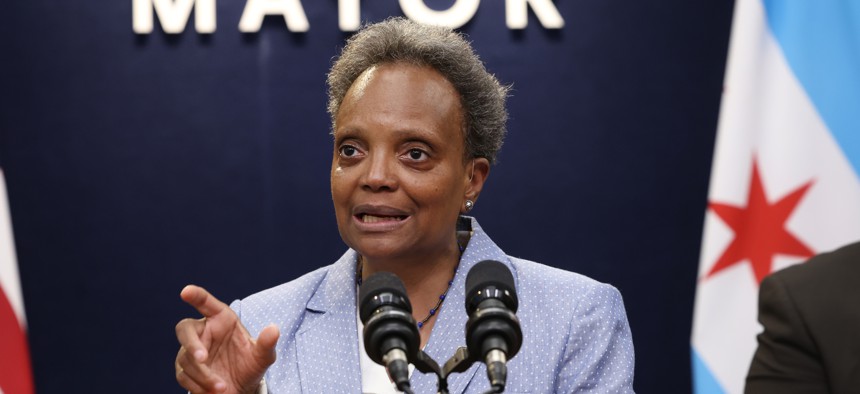  Then Chicago Mayor Lori Lightfoot announces that she has declared a state of emergency to help deal with an influx of migrants during a press conference on May 9, 2023, in Chicago. According to the mayor, 100 to 200 migrants are arriving in the city each day.