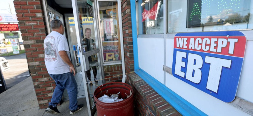 A convenience store advertises that they except EBT cards.