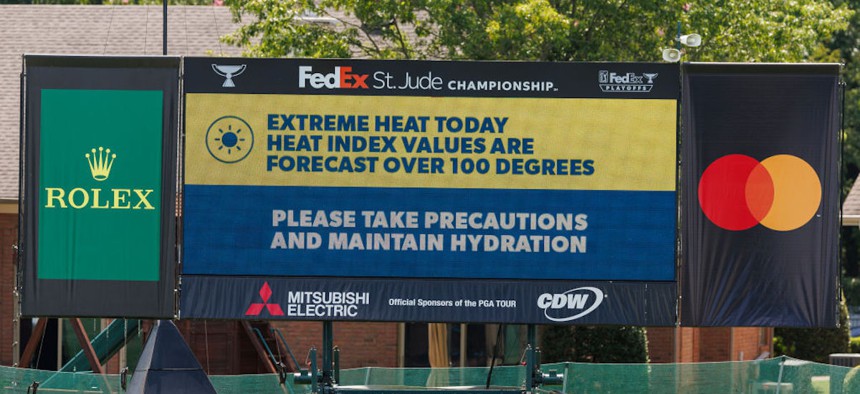 A heat advisory is seen on a leaderboard during the FedEx St. Jude Championship at TPC Southwind on Aug. 16, 2024, in Memphis, Tennessee. 