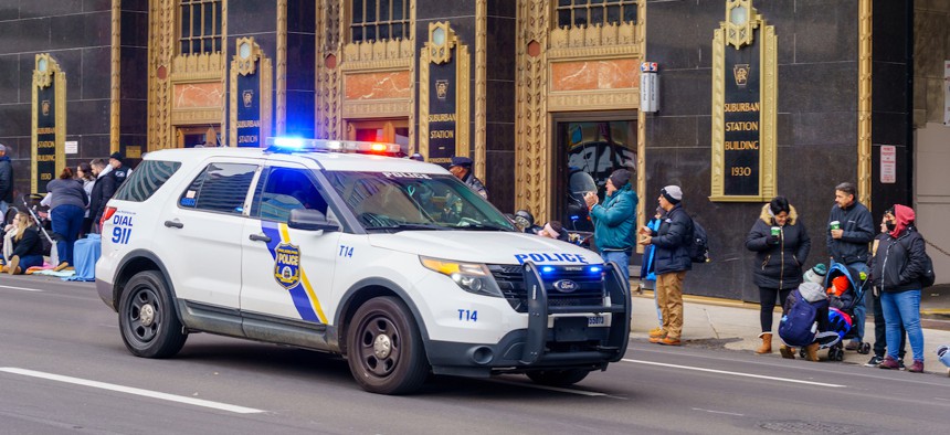 A Philadelphia Police Department marked vehicle with its emergency light activated on Nov. 25, 2021.