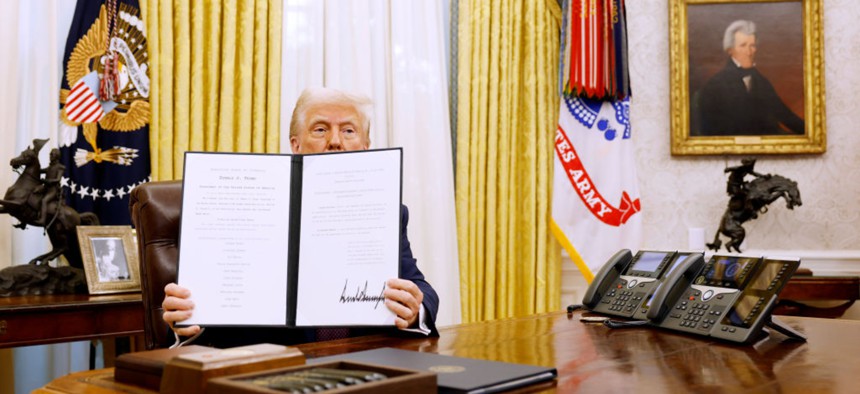 President Donald Trump after signing an executive order in the early days of his term. Trump moved quickly to rescind former President Joe Biden's executive order on artificial intelligence and issue his own.