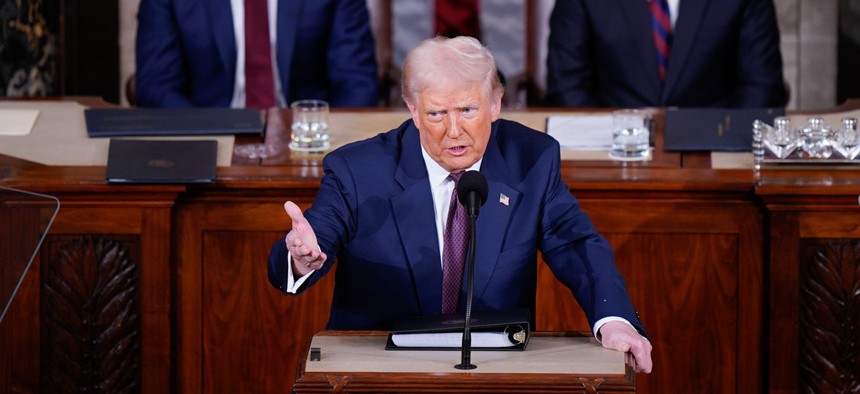 President Donald J Trump addresses a joint session of Congress as Vice President JD Vance and Speaker of the House Mike Johnson (R-LA) listen in the Capitol building's House chamber on Tuesday, March 04, 2025 in Washington, DC.