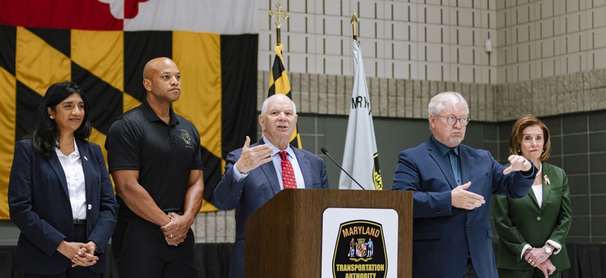 Then-Sen. Ben Cardin (center) and Maryland Gov. Wes Moore (second from left) among those at a press conference after the Key Bridge collapse in Baltimore last year.
