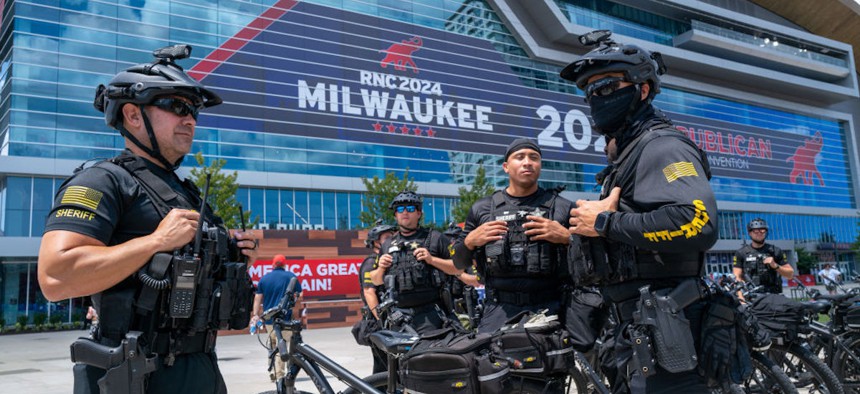 Police stand guard outside of the Republican National Convention (RNC) on the third day of the event on July 17, 2024, in Milwaukee, Wisconsin.