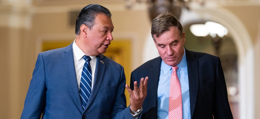 Sen. Alex Padilla, D-Calif., left, and Sen. Mark Warner, D-Va., arrive for President of Ukraine Volodymyr Zelenskyy's meeting with U.S. senators in the Capitol on Thursday, September 21, 2023. Padilla and Warner sent a letter to the ODNI Sept. 15 calling for a briefing on election security for upcoming races.