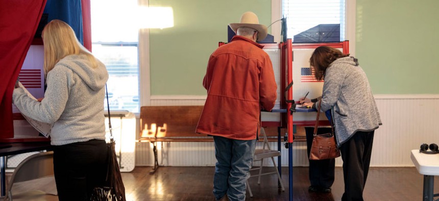 Voters cast their midterm ballots on November 6, 2018 at Briles Schoolhouse in Peoria Township, Kansas.