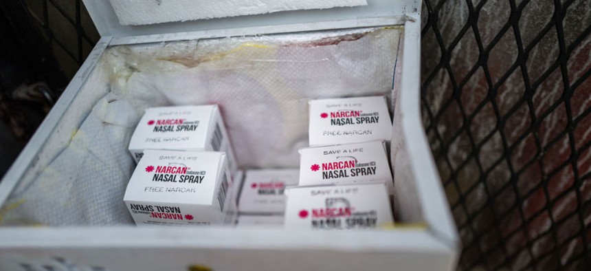 A free Narcan dispenser stands along Kensington Avenue as police begin the clearing of a homeless encampment in the Kensington neighborhood on May 8, 2024, in Philadelphia.