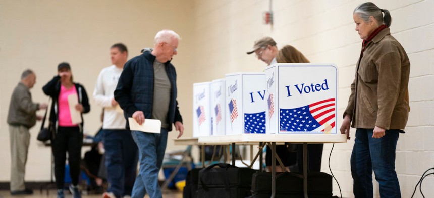 People vote during the South Carolina Republican presidential primary at Kilbourne Baptist Church on Feb. 24, 2024, in Columbia, South Carolina.