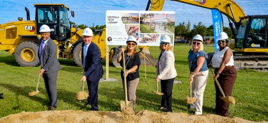 Osceola County officials celebrate the groundbreaking of the Osceola Tech Library.