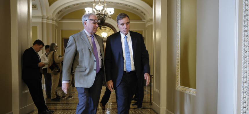 Sens. Tim Kaine, D-Va., and Mark Warner, D-Va., at the U.S. Capitol on Sept. 28, 2023. The pair welcomed the news that the National Science Foundation headquarters will remain in their state. 