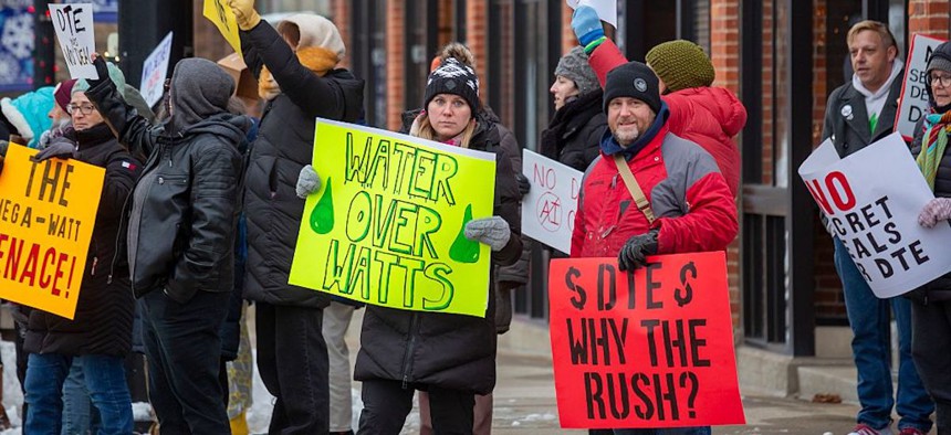 Rural Michigan residents rally against the $7 billion Stargate data center planned on southeast Michigan farm land. 
