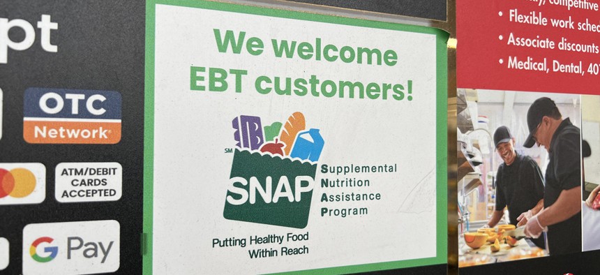 Close-up of sign for SNAP and EBT at a Safeway supermarket in Lafayette, California with text reading We Welcome EBT Customers, November 13, 2025. 