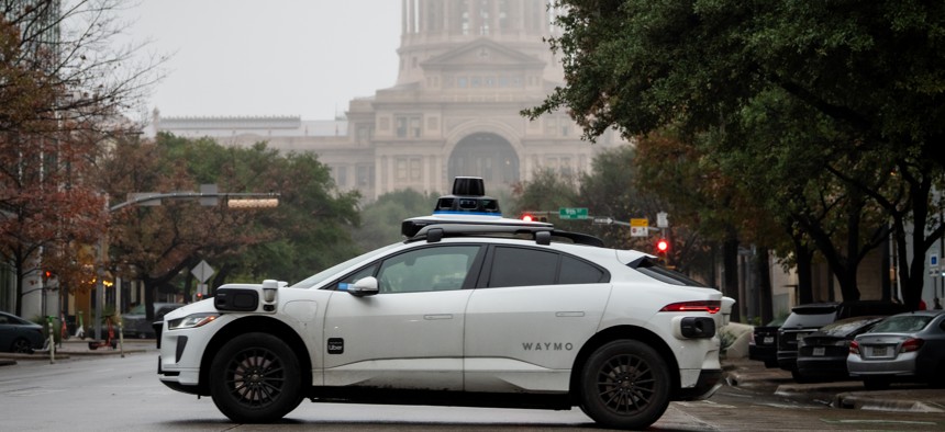 A Waymo drives across in front of the Capitol Building in Austin, Texas, on Jan. 23, 2025.