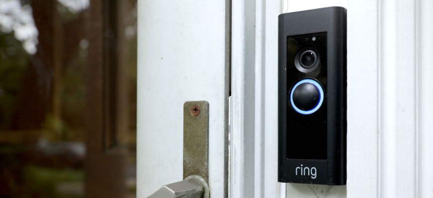 A doorbell device with a built-in camera made by home security company Ring is seen on Aug. 28, 2019, in Silver Spring, Maryland.