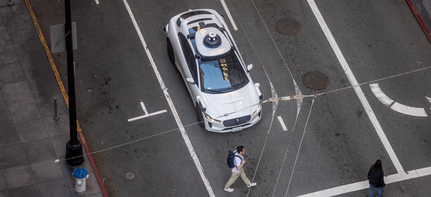 High angle view of an Alphabet's Waymo self-driving car in downtown San Francisco on April 18, 2024.