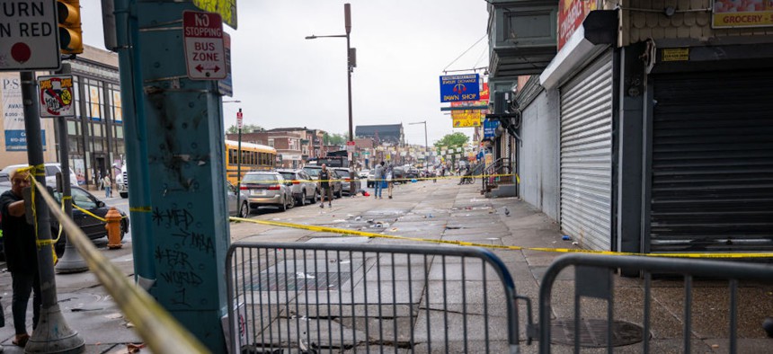 Police lock down part of Kensington Avenue during the clearing of a homeless encampment in the Kensington neighborhood on May 8, 2024, in Philadelphia.
