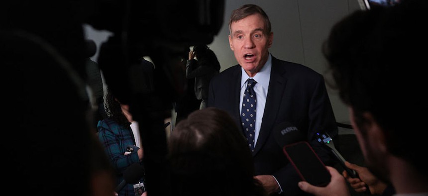 Vice Chairman of the Senate Intelligence Committee Sen. Mark Warner (D-VA) speaks to members of the media after participating in a hearing on worldwide threats in the Hart Senate Office Building on March 18, 2026 in Washington, DC. 