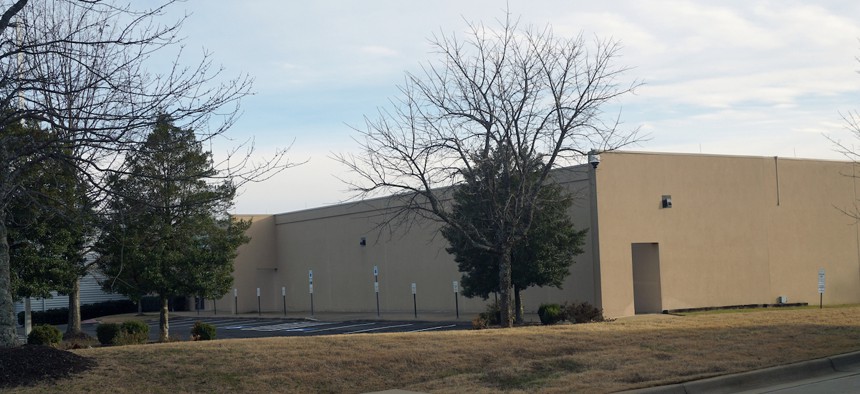 The exterior of a TierPoint data center with a beige commercial building, accessible parking spaces, and winter landscaping defining the quiet light‑industrial setting. Little Rock, Arkansas, USA Jan. 17, 2026