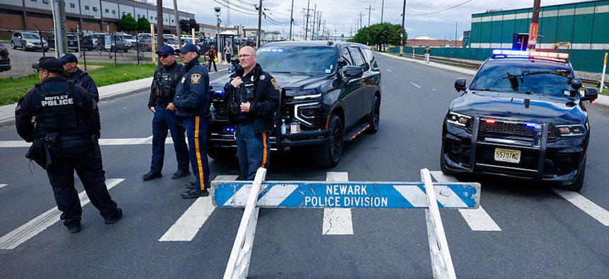 New Jersey State police officers stand guard outside Delaney Hall, which is being used as an Immigration and Customs Enforcement detention center, in Newark, New Jersey, on May 30, 2026.