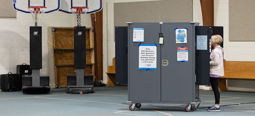 Barbara Mordecai casts her vote at the Mt. Zion United Methodist Church polling station for the primary runoff election on June 16, 2026, in Marietta, Georgia.