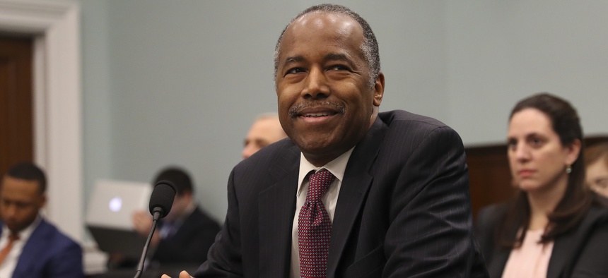 Housing and Urban Development Secretary Ben Carson takes his seat before testifying before a House Committee on Appropriation subcommittee hearing on Capitol Hill in Washington, Tuesday, March 20, 2018.