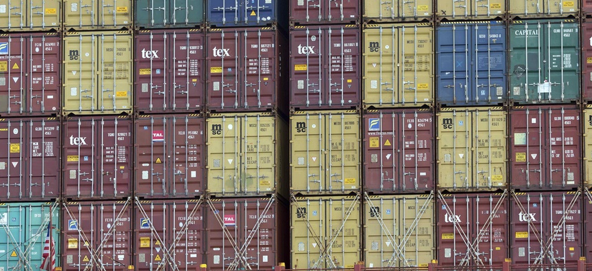 In this Thursday, July, 5, 2018 photo, a bay of 40-foot shipping container fill the stern of a container ship at the Port of Savannah in Savannah, Ga.